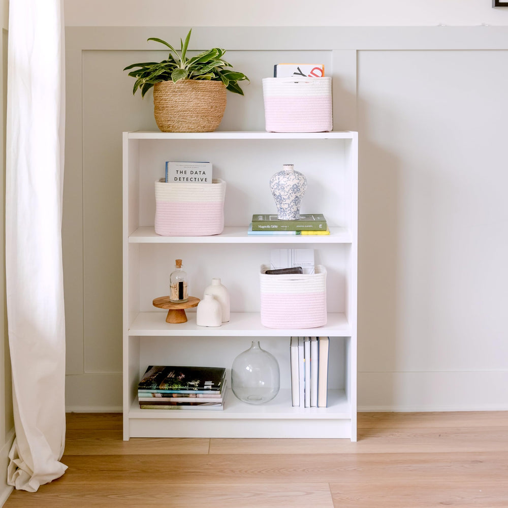 NaturalCozy bathroom closet arrangement highlights compact decorative storage.