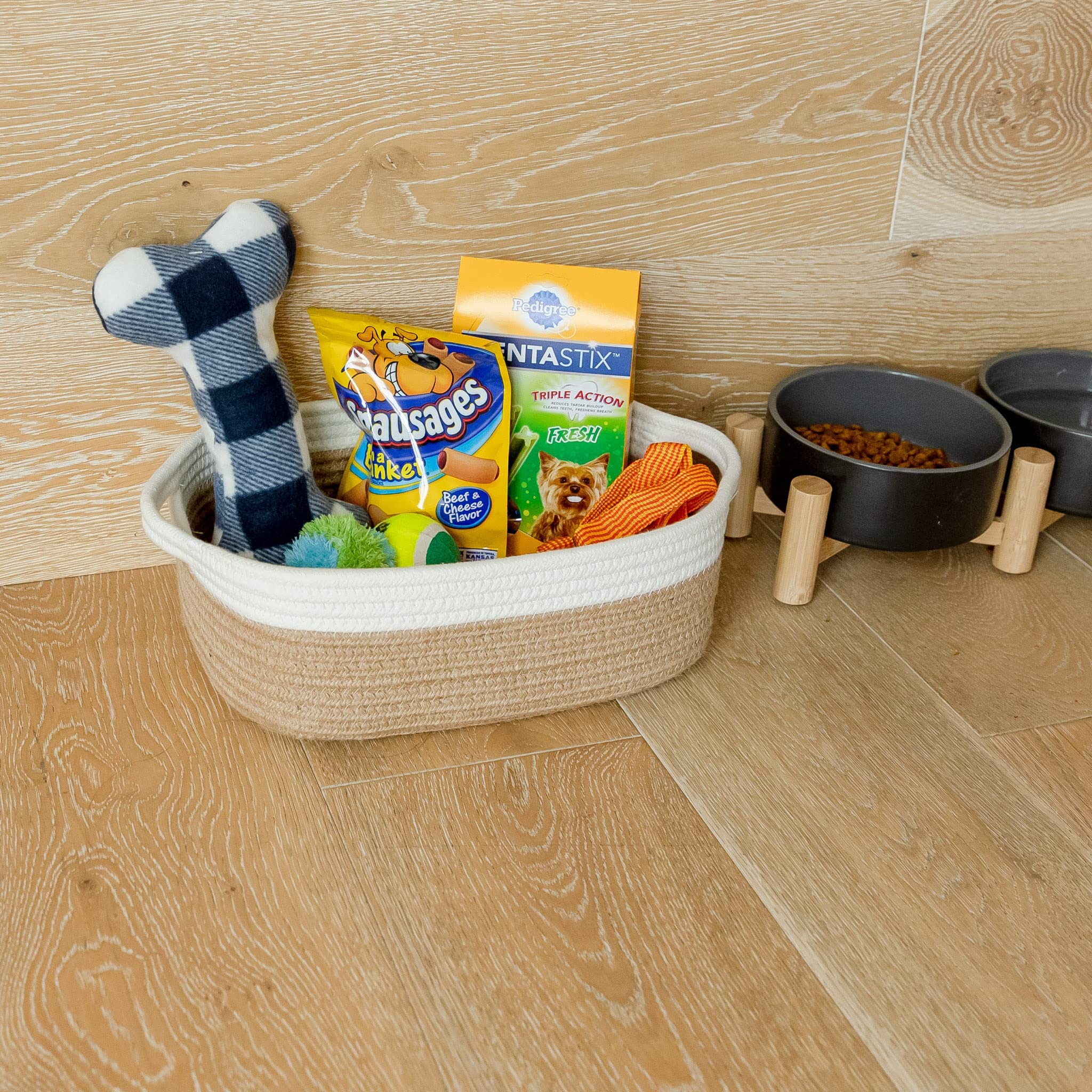 NaturalCozy bathroom organizer basket keeping small towels tidy and within reach.