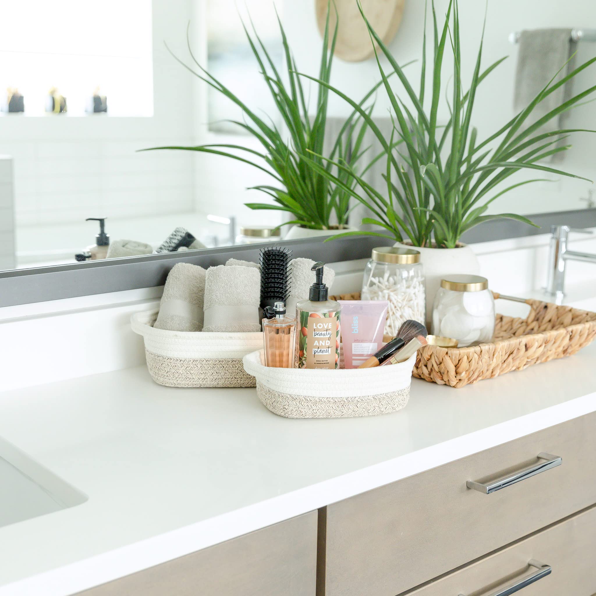 NaturalCozy bathroom towel basket neatly holds towels.