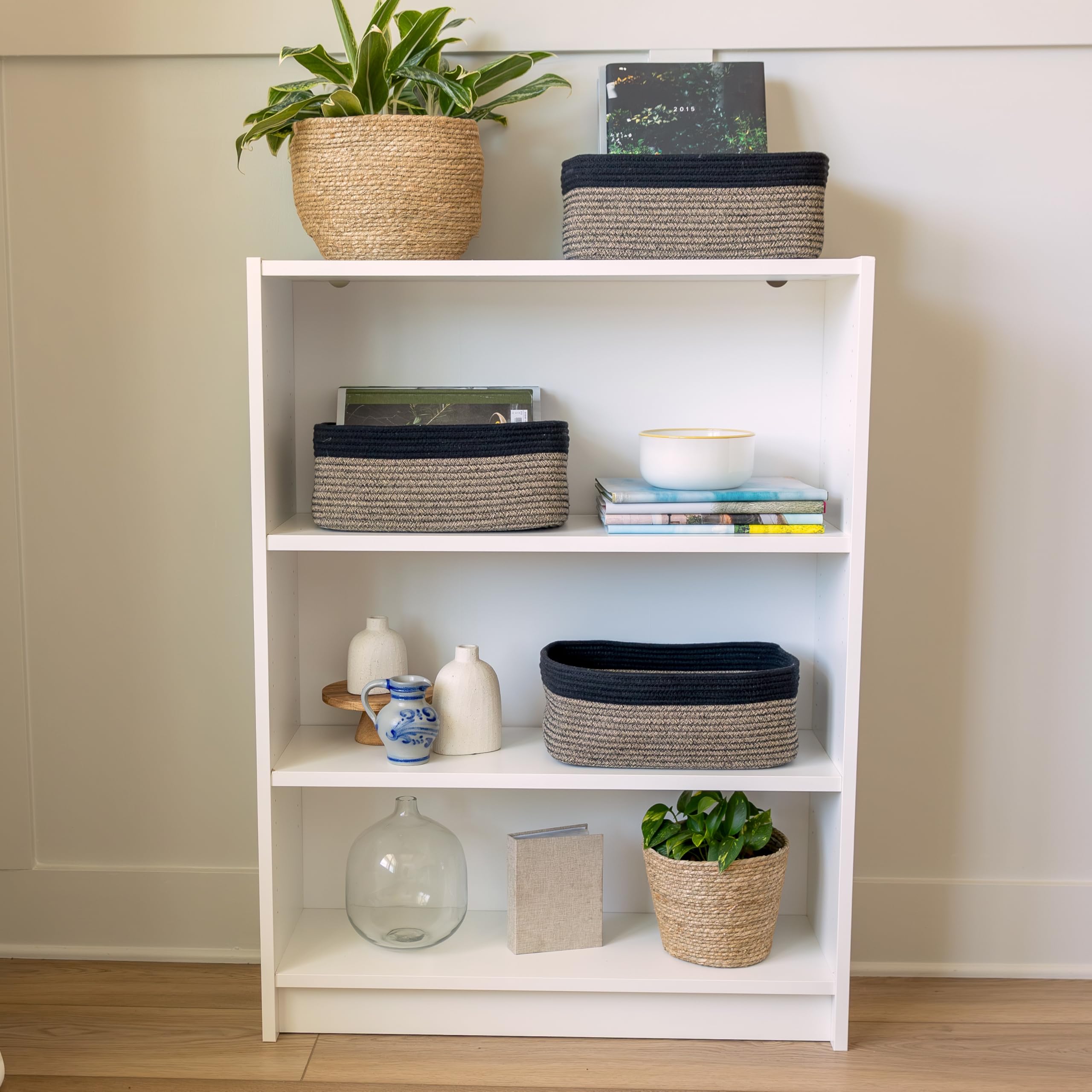 NaturalCozy storage bins on shelf providing decorative organization.
