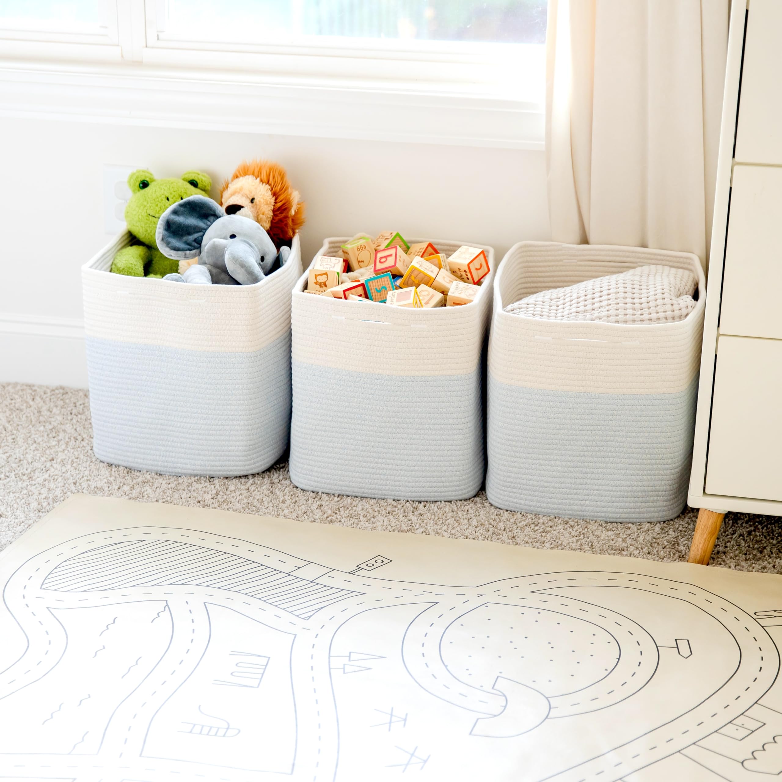 NaturalCozy Kallax bins hidden handles indicate clean look and easy access.