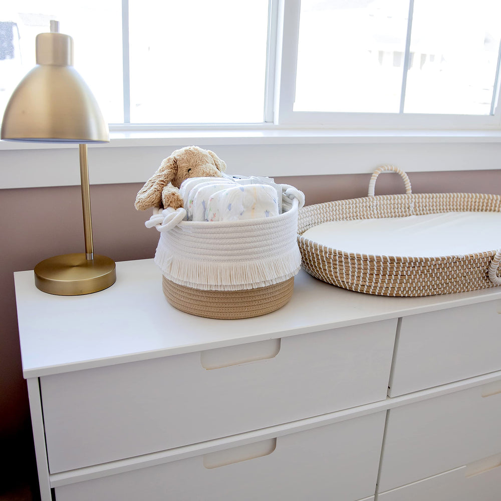 NaturalCozy medium basket on changing table simplifies diapering area clutter and supplies.