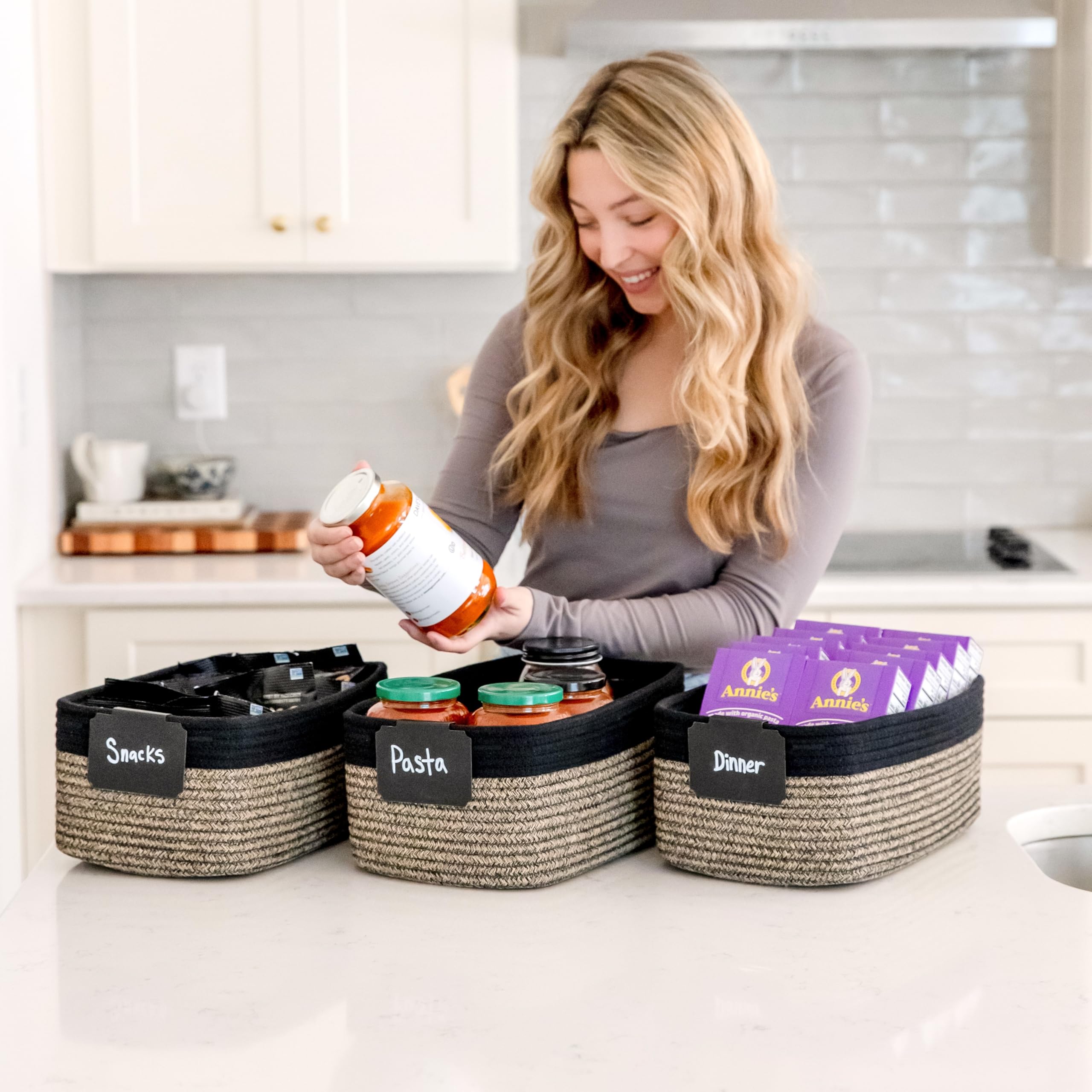 NaturalCozy nursery storage basket organizing blankets and essentials.