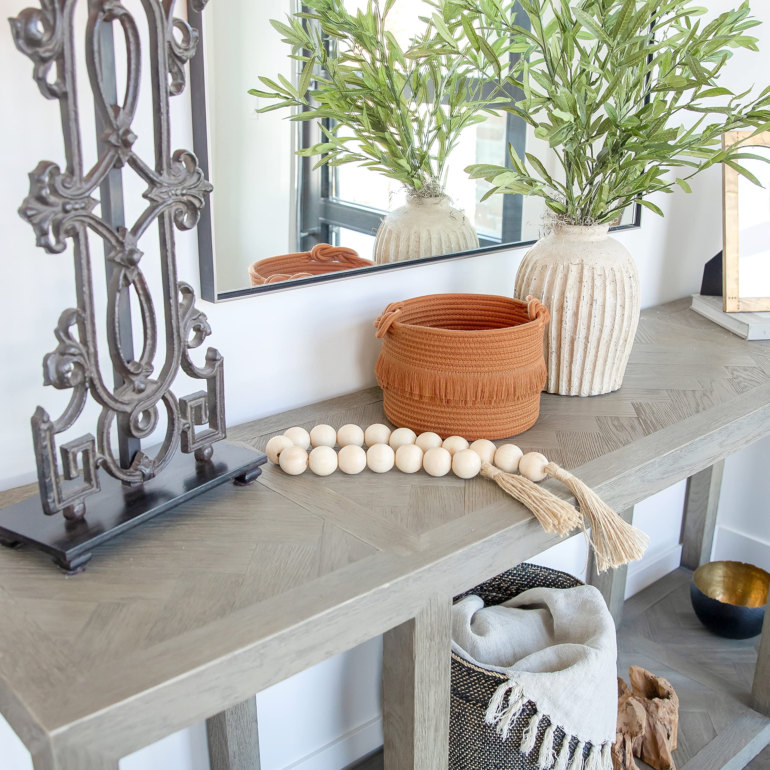 NaturalCozy planter decor basket doubles as planter cover and decor.