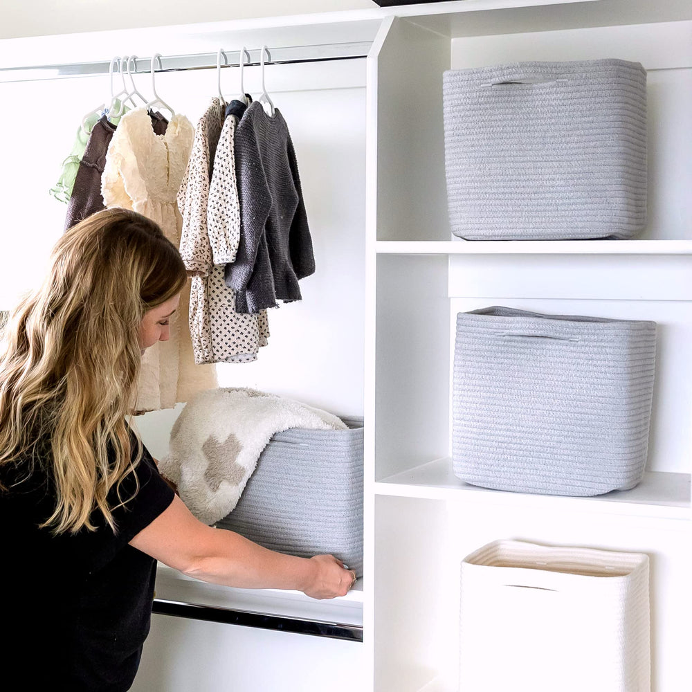 NaturalCozy shelf organization with square bins neatly tidying shelves
