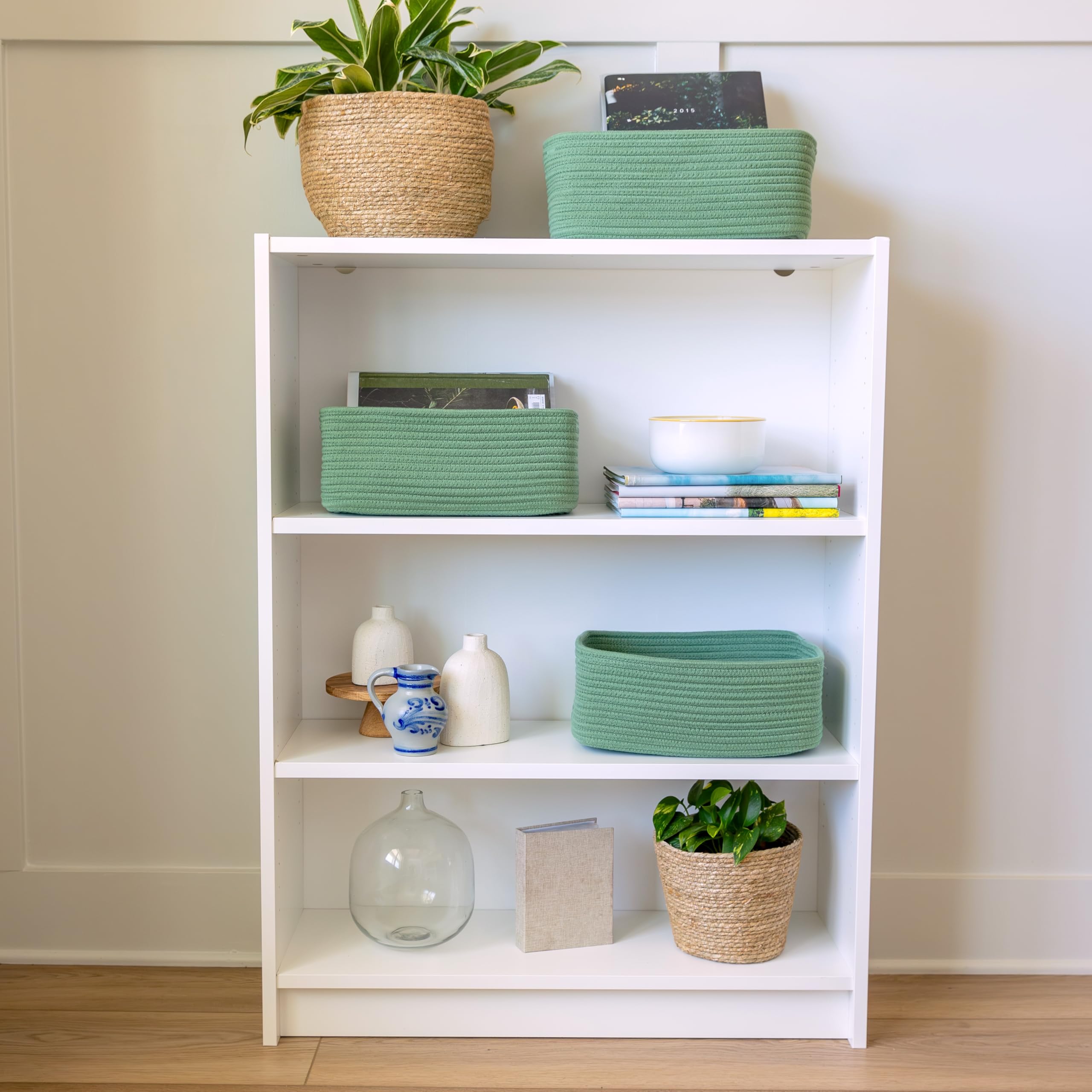 NaturalCozy stackable baskets on shelf maximize compact storage.