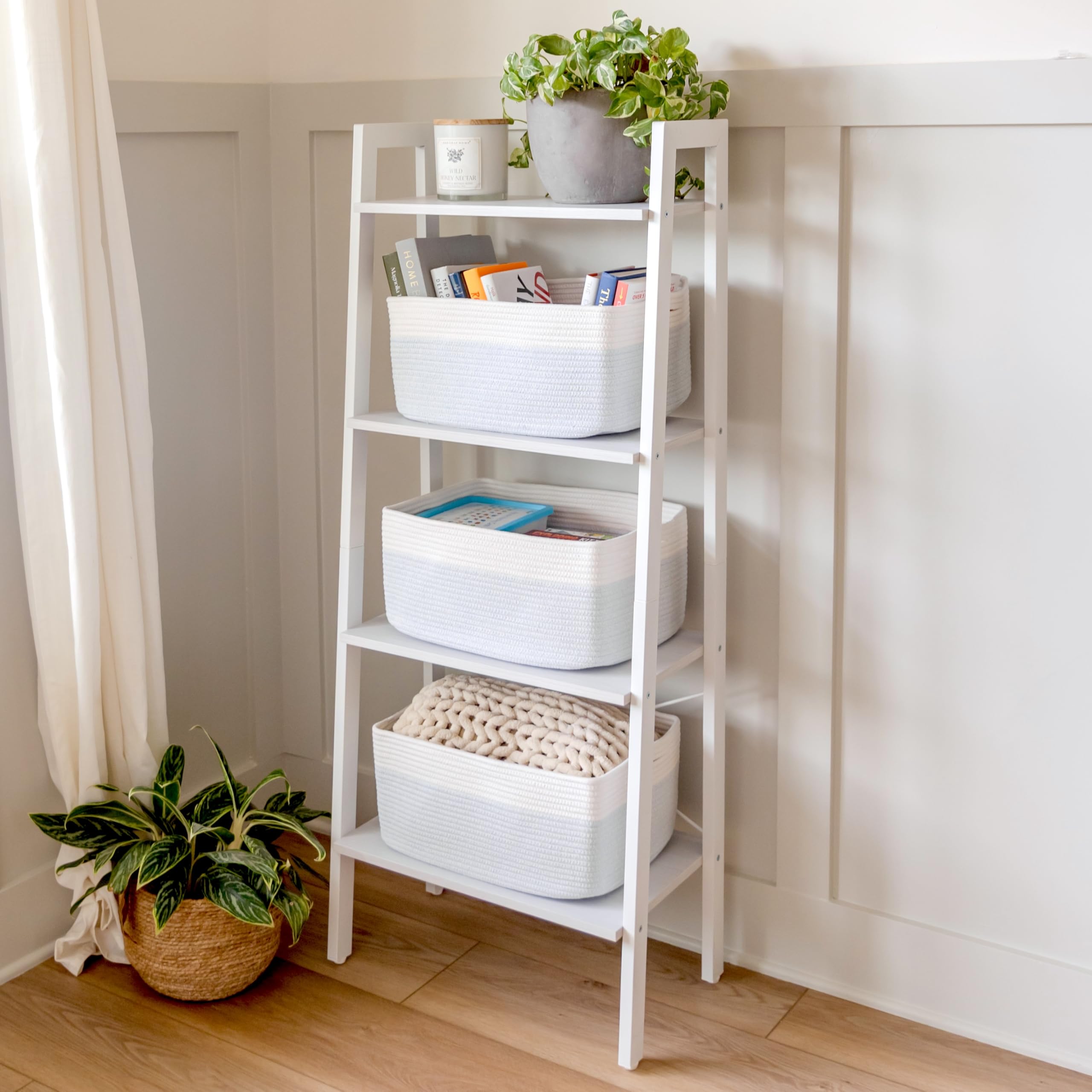 NaturalCozy Storage Baskets on-shelf setup organize books and textiles neatly.