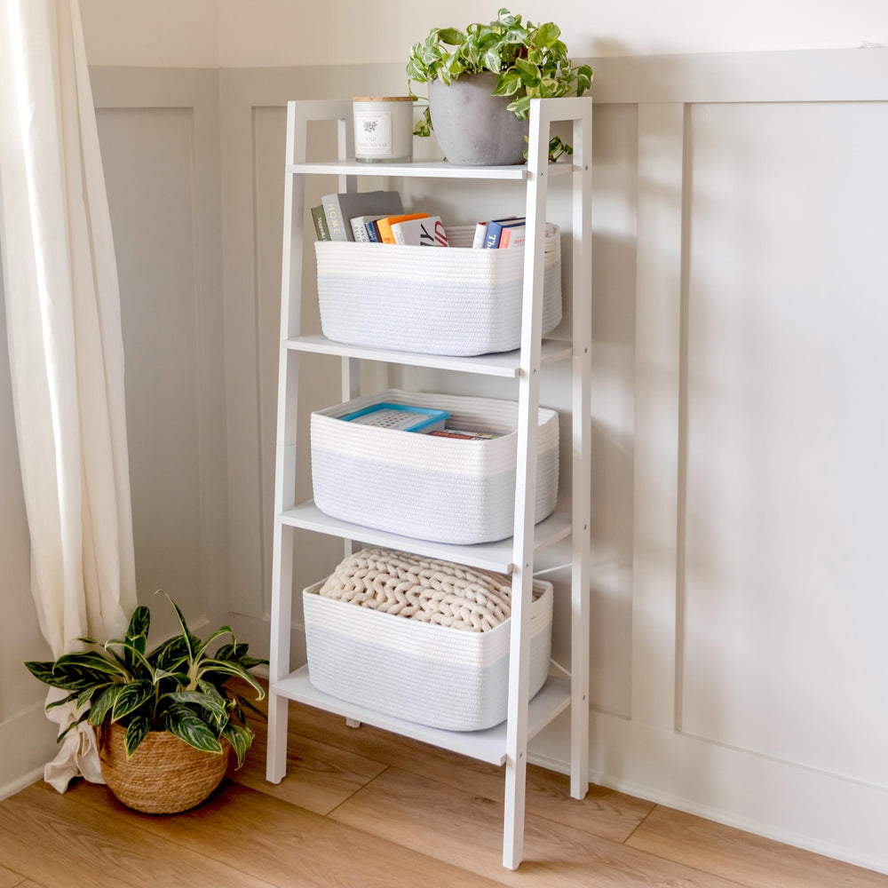 NaturalCozy Storage Baskets on-shelf setup organize books and textiles neatly.