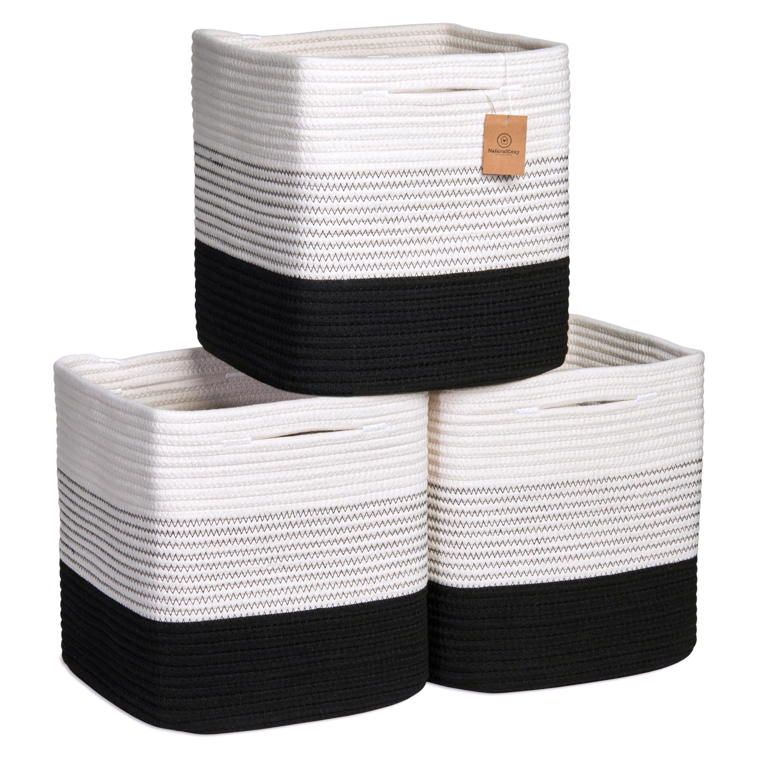 NaturalCozy storage cubes demonstrate folding method for tidy shelves