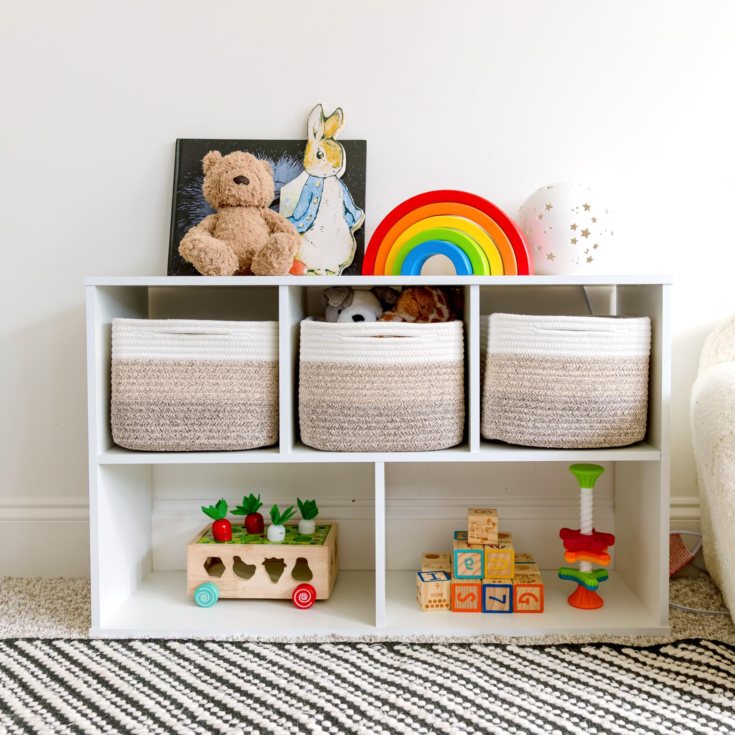 NaturalCozy nursery setup with 9x9x7 cubes neatly organizing toys and blankets.