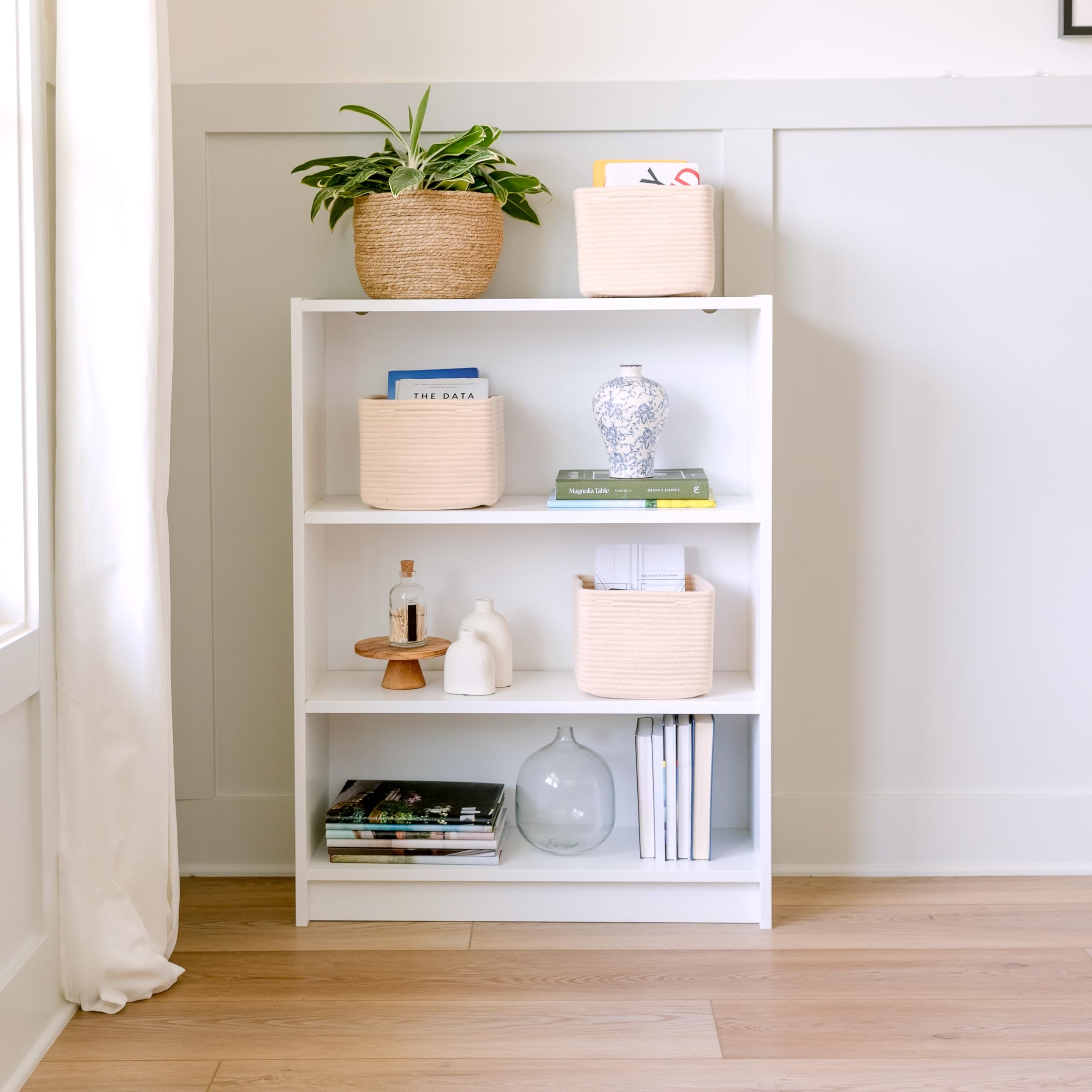 NaturalCozy Storage Cubes nursery-shelves ideal beside plush toys and books.