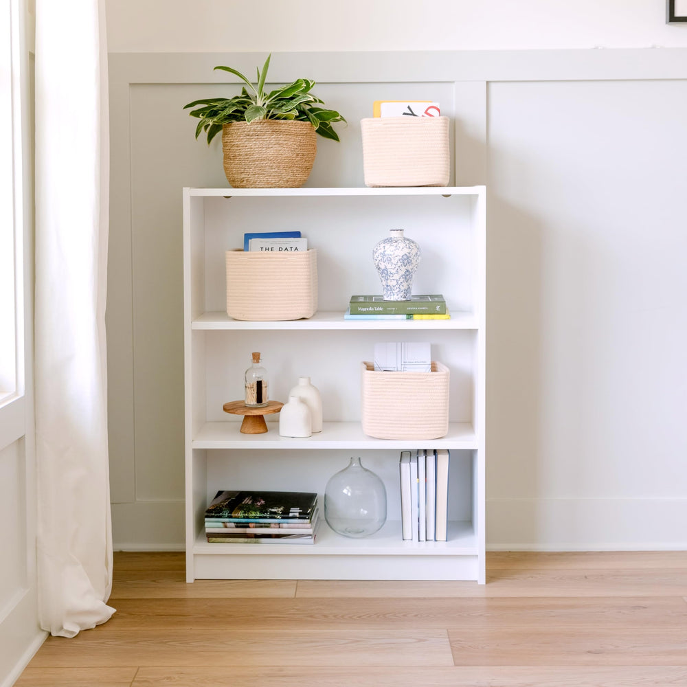 NaturalCozy Storage Cubes nursery-shelves ideal beside plush toys and books.