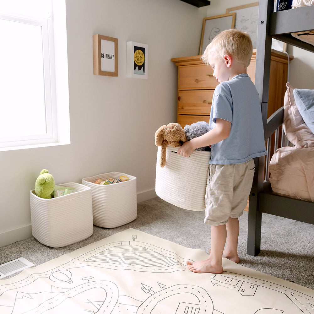 NaturalCozy square storage baskets for closet organization in kids' room.