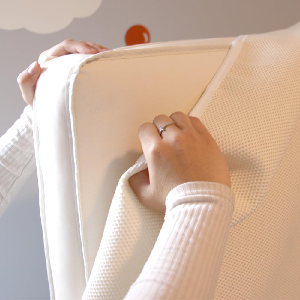 Naturepedic breathable non-toxic design supports safe baby sleep