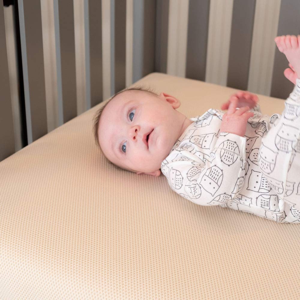 Naturepedic lightweight crib mattress weighs only 11 lbs for quick sheet changes
