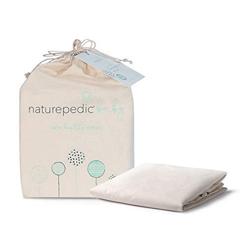 Naturepedic machine-washable crib pad demonstrates easy, parent-friendly maintenance