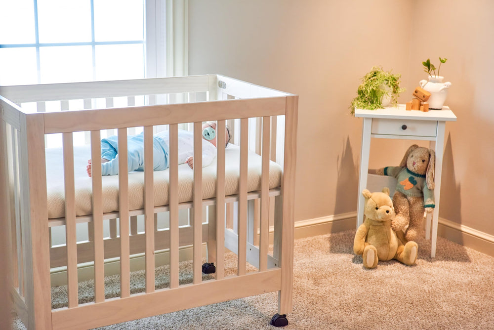 Naturepedic Organic Mini Crib Mattress waterproof cover resists spills for easy cleanup