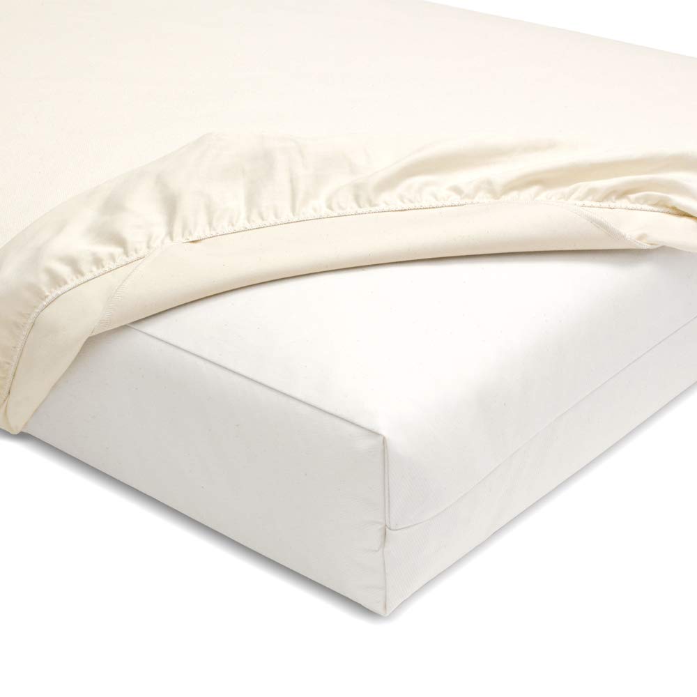 Naturepedic organic waterproof crib pad top view shows a soft, skin-friendly cotton surface