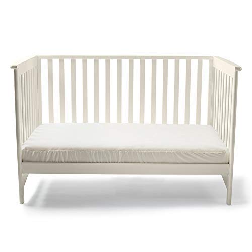Naturepedic removable crib pad cover enables quick changes and easy cleaning