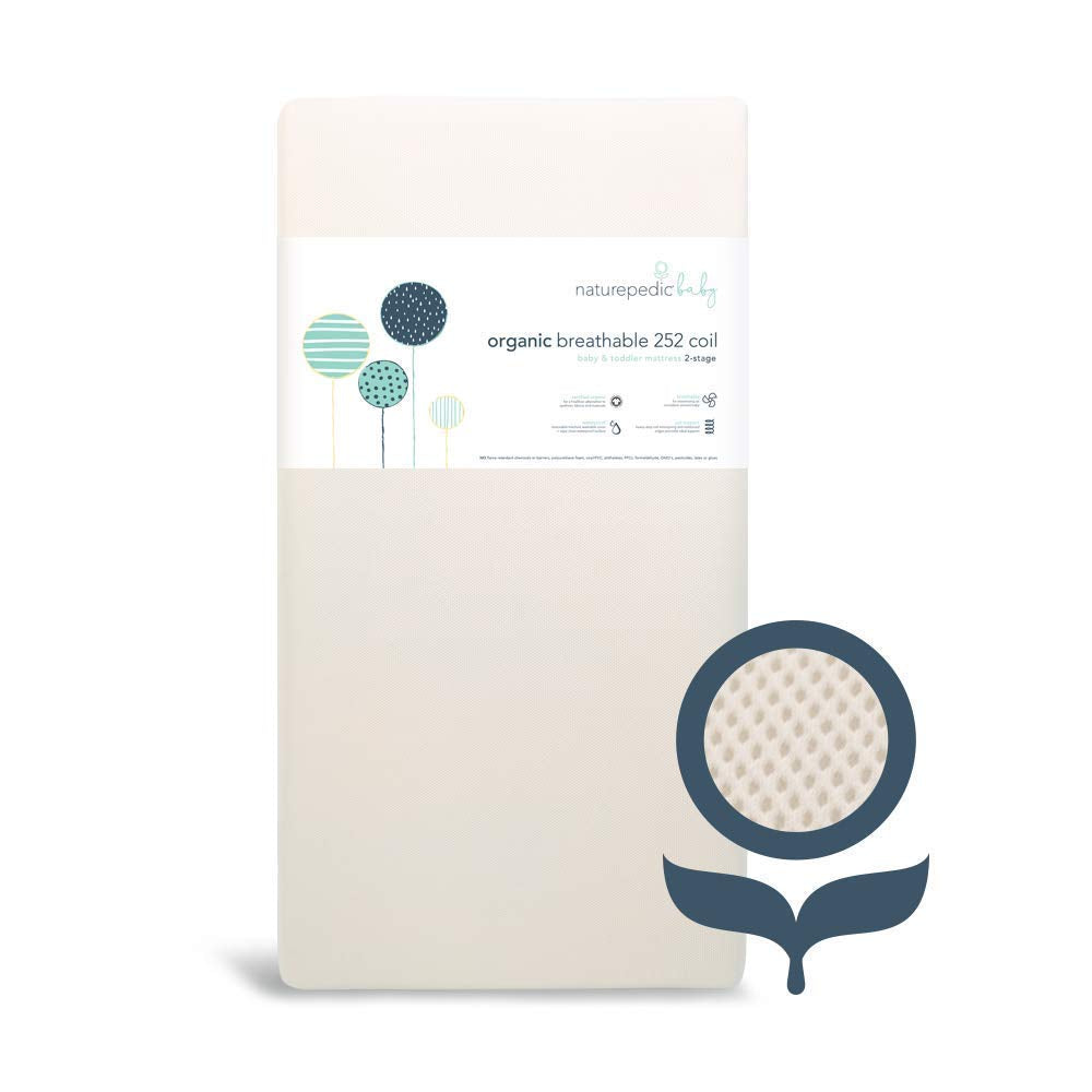 Naturepedic two-stage crib mattress supports infant-to-toddler sleep transition.