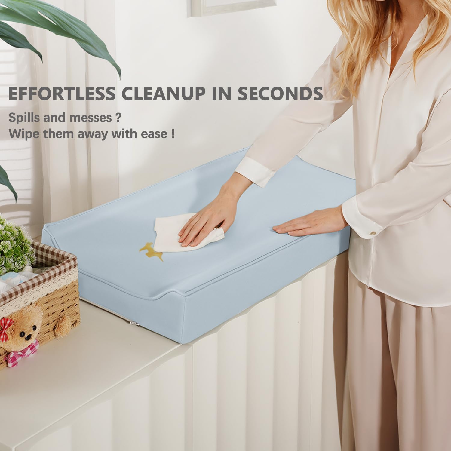 Navari blue changing pad cover with non-slip base adds secure stability.