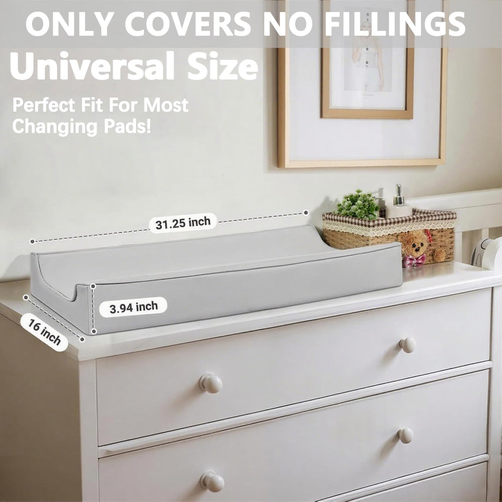 Navari changing pad cover being wiped clean quickly for mess-free changes.