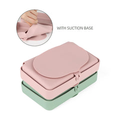 Nearbyme blush silicone plate shown as travel-friendly compact plate in bag.