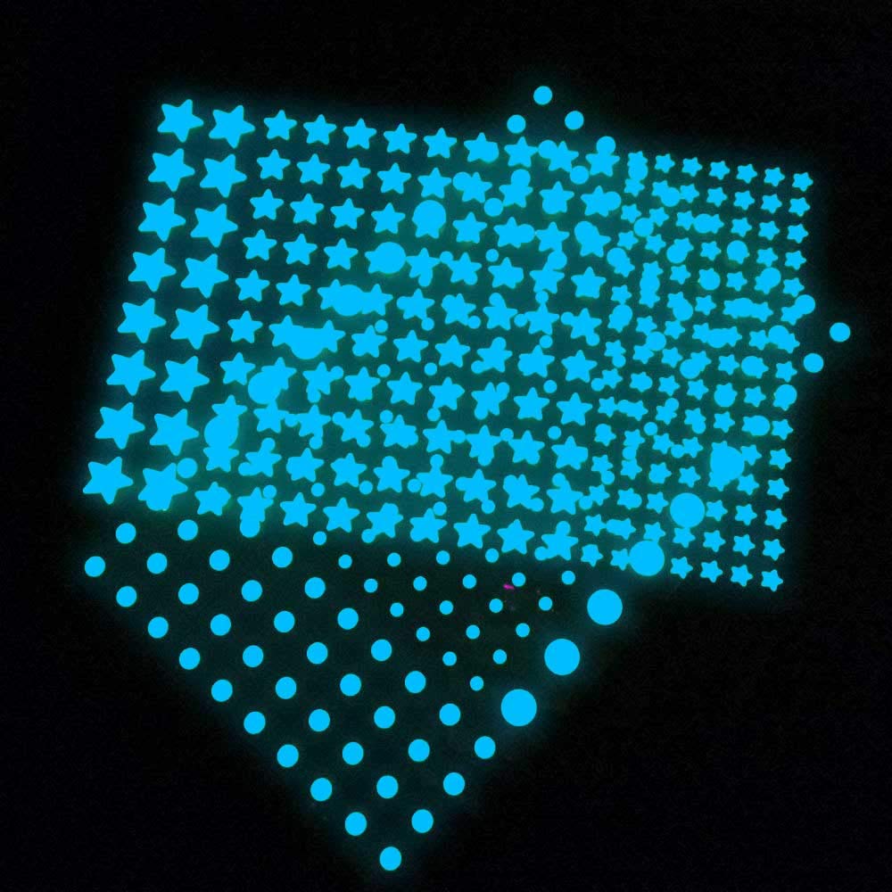 Neasyth Glow Stars adhesive dots demonstrating easy wall application