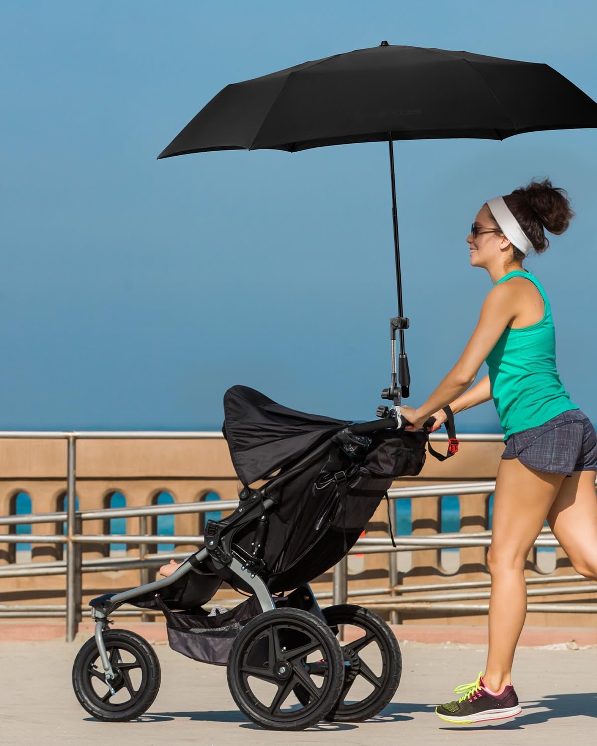 Nediea umbrella holder on handlebar provides secure universal clamp fit.