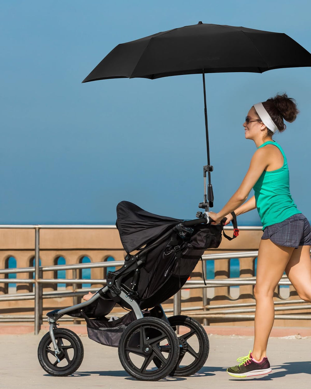 Nediea umbrella holder on handlebar provides secure universal clamp fit.