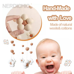 Nerdichic gender-neutral baby mobile is easy to hang for quick setup.