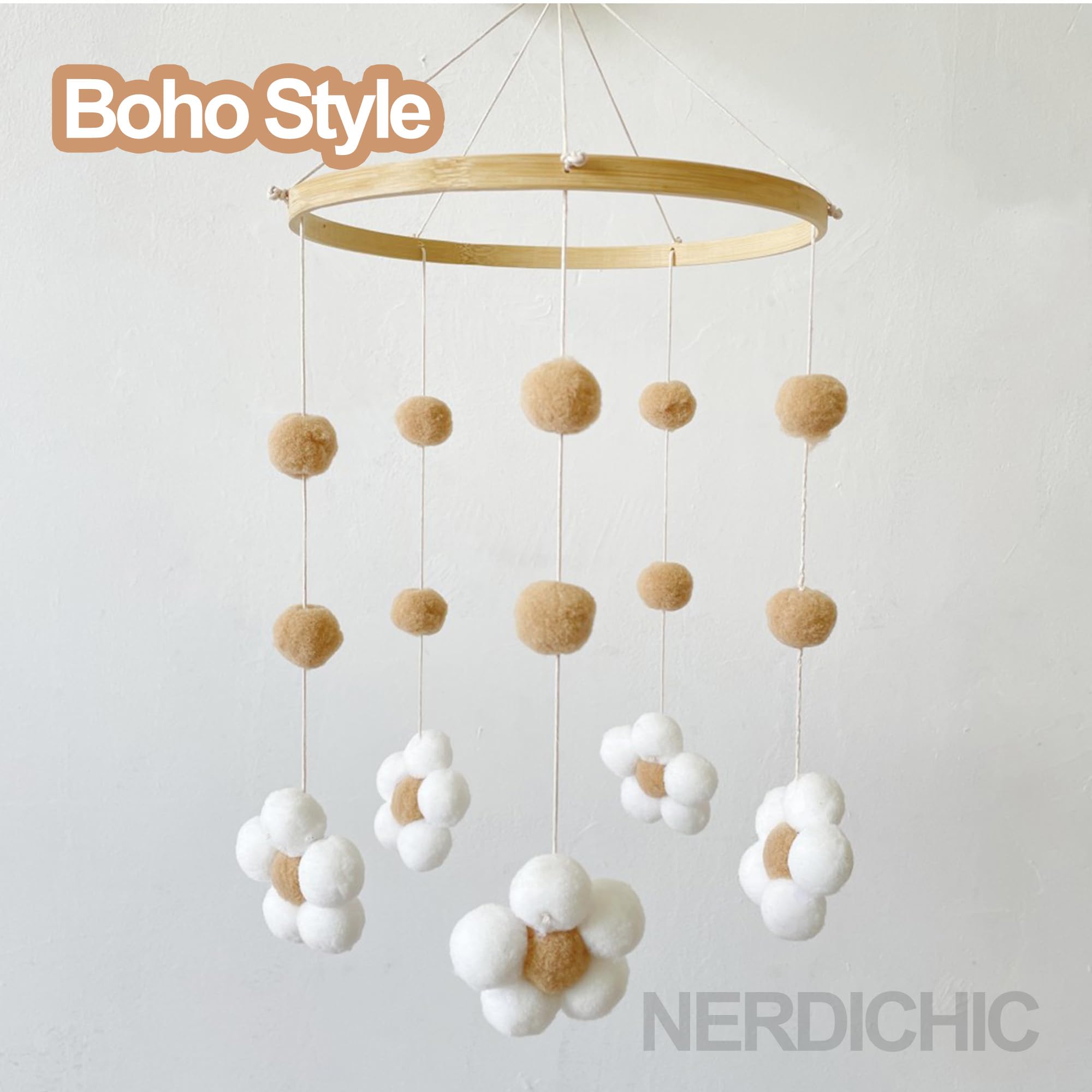 Nerdichic nursery decor mobile blends soft wood and felt for a cozy room.