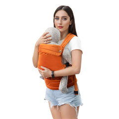 NEST BLANCHE baby carrier back view in orange showing balanced support