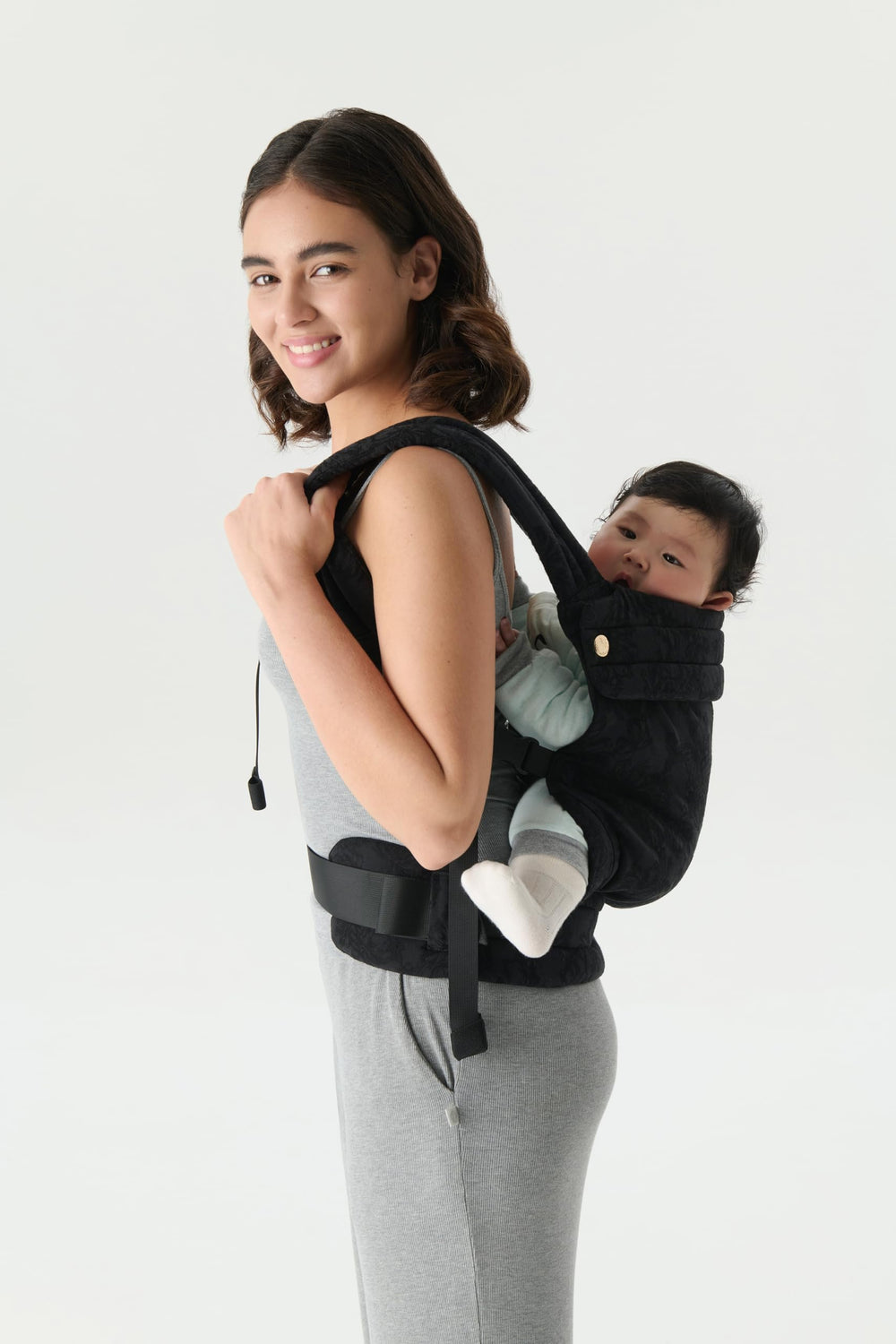 NEST BLANCHE ebony carrier paired with outfits for daily wear