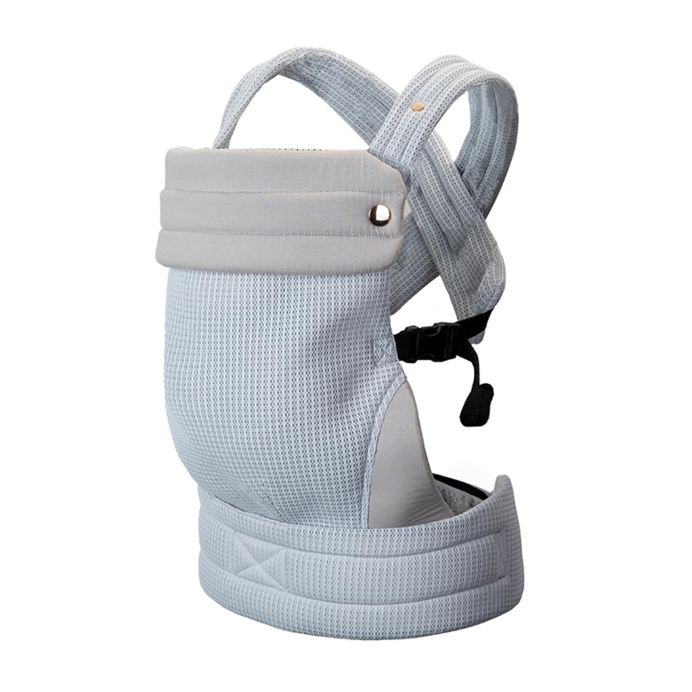 NEST BLANCHE baby carrier front-angled view shows ergonomic fit for comfortable strolls.