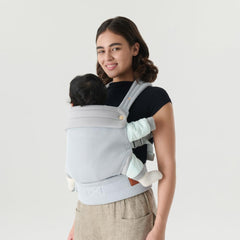 NEST BLANCHE baby carrier illustrating M-shape seat for hip support.