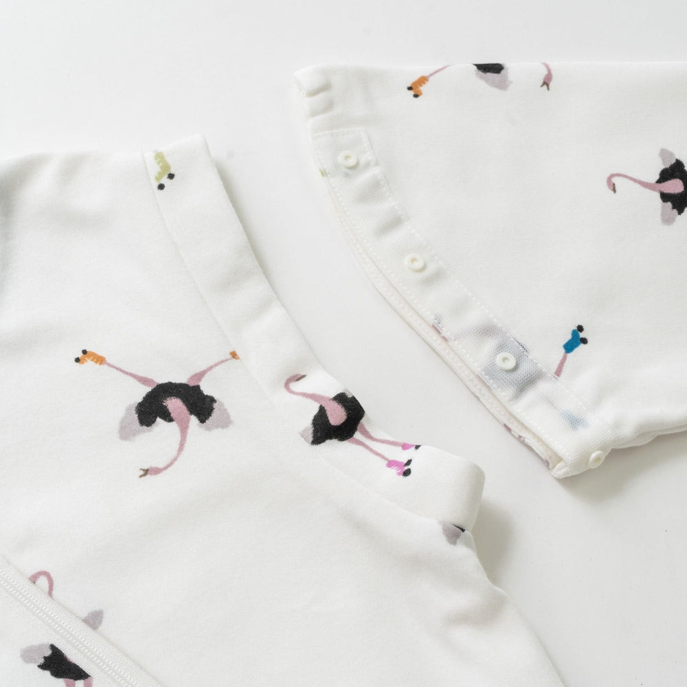 Nest Designs organic cotton sleep bag featuring a two-way zipper for easy diaper changes.