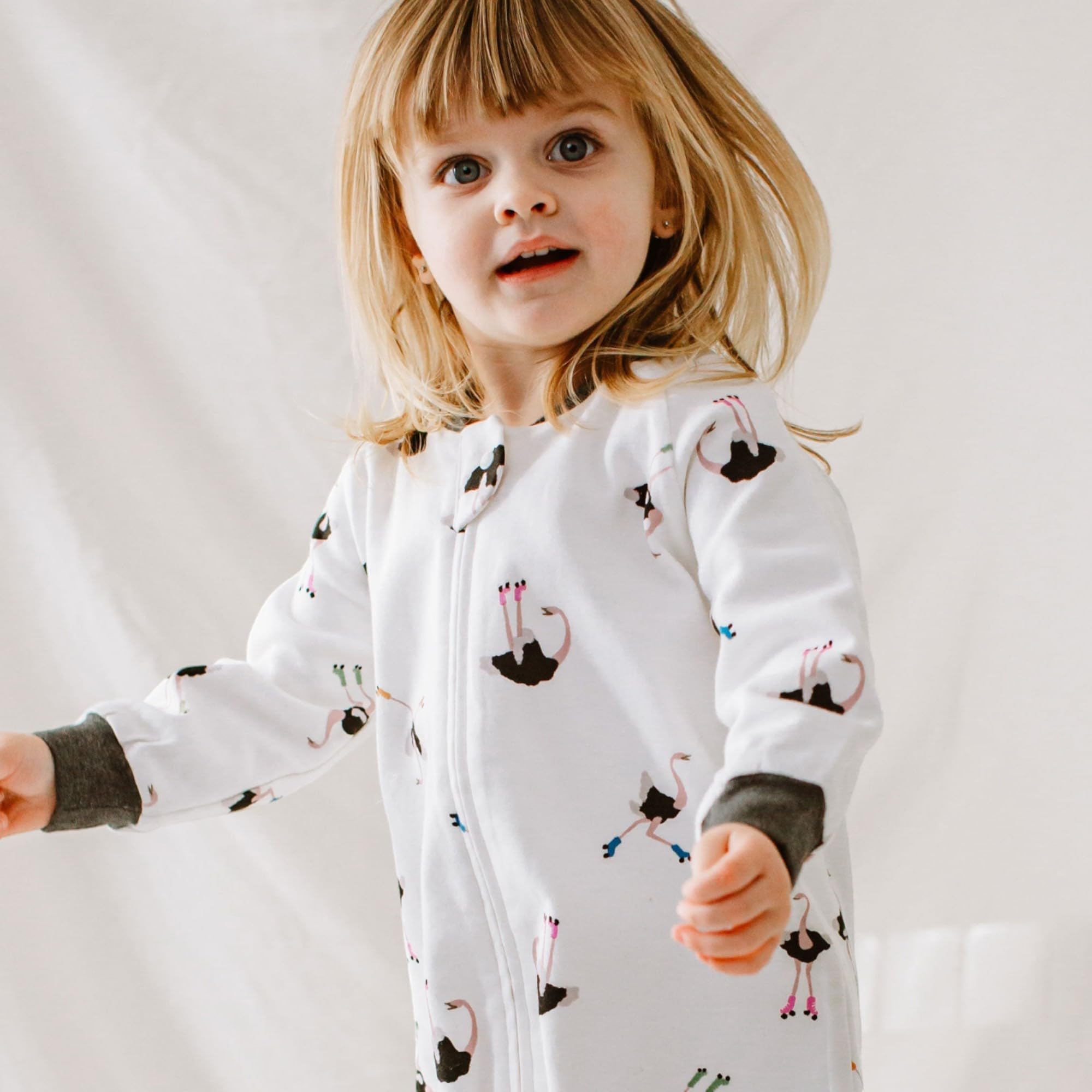 Nest Designs bottom snaps enable fast diaper changes during bedtime routines.