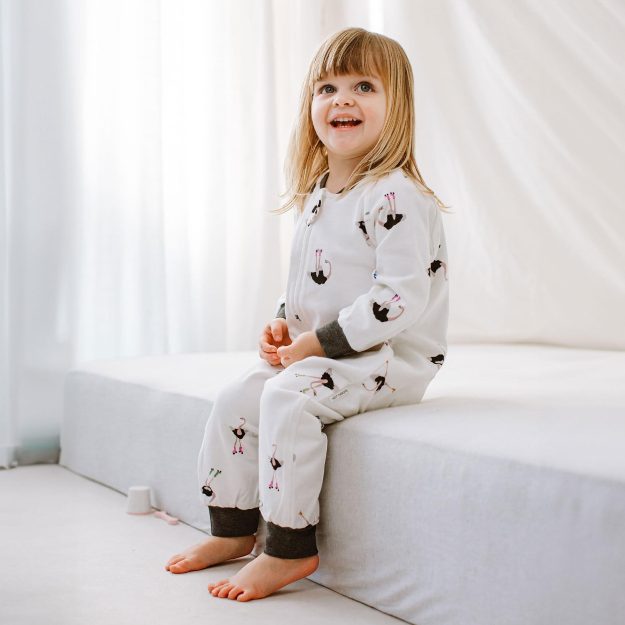 Nest Designs zipper area demonstrates two-way closure for quick diaper changes.
