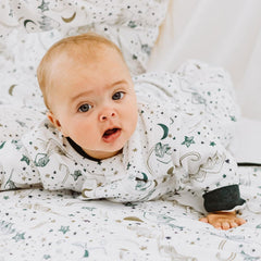 Nest Designs Stars White sleep bag with 1.0 TOG for moderate room temperatures.