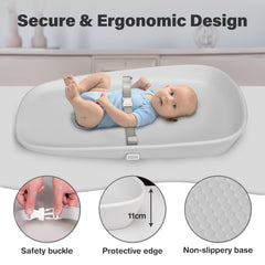 Nest Mello changing pad in use on a table with secure restraint belt