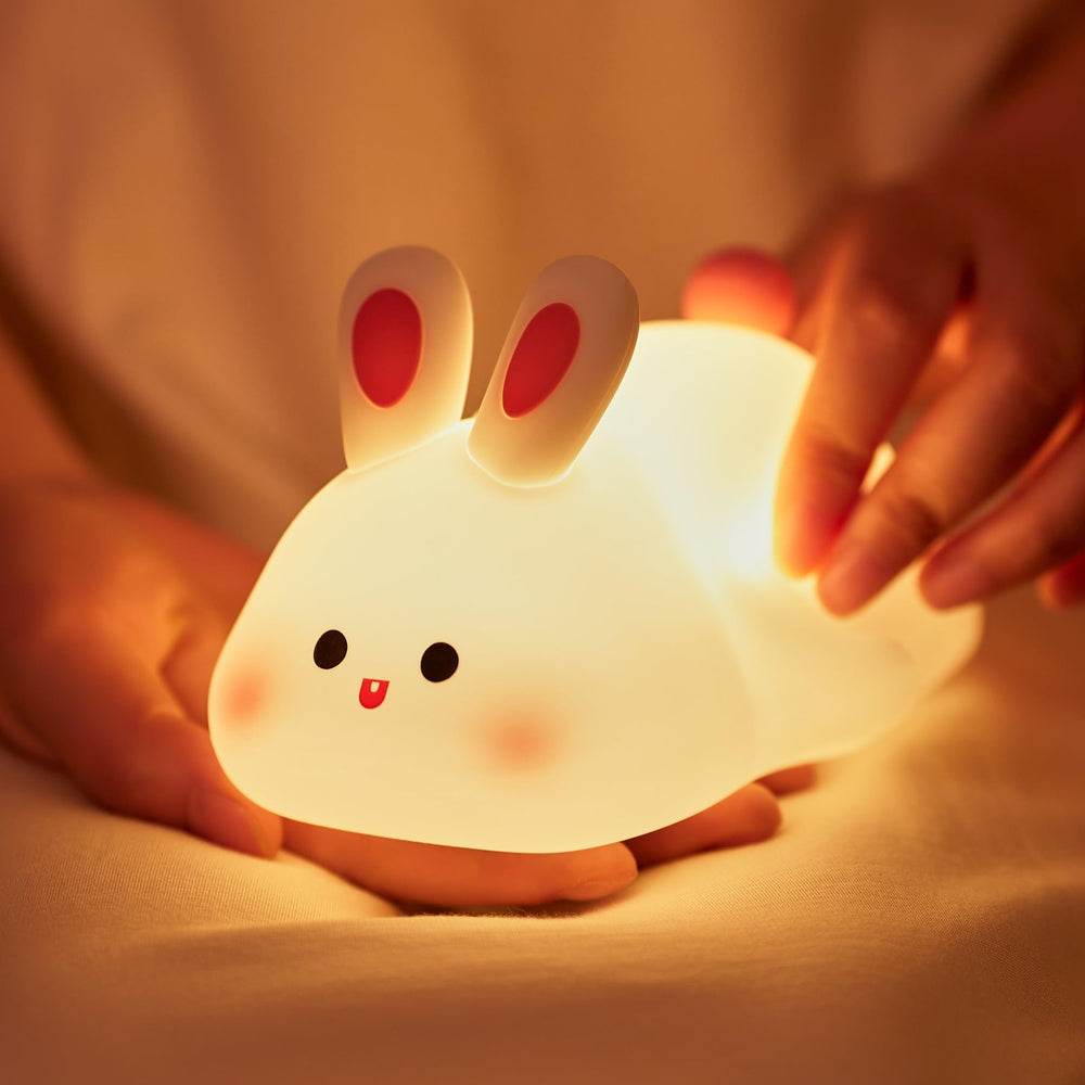 NesveCit big-face rabbit night light on table offers gentle ambient glow for bedtime