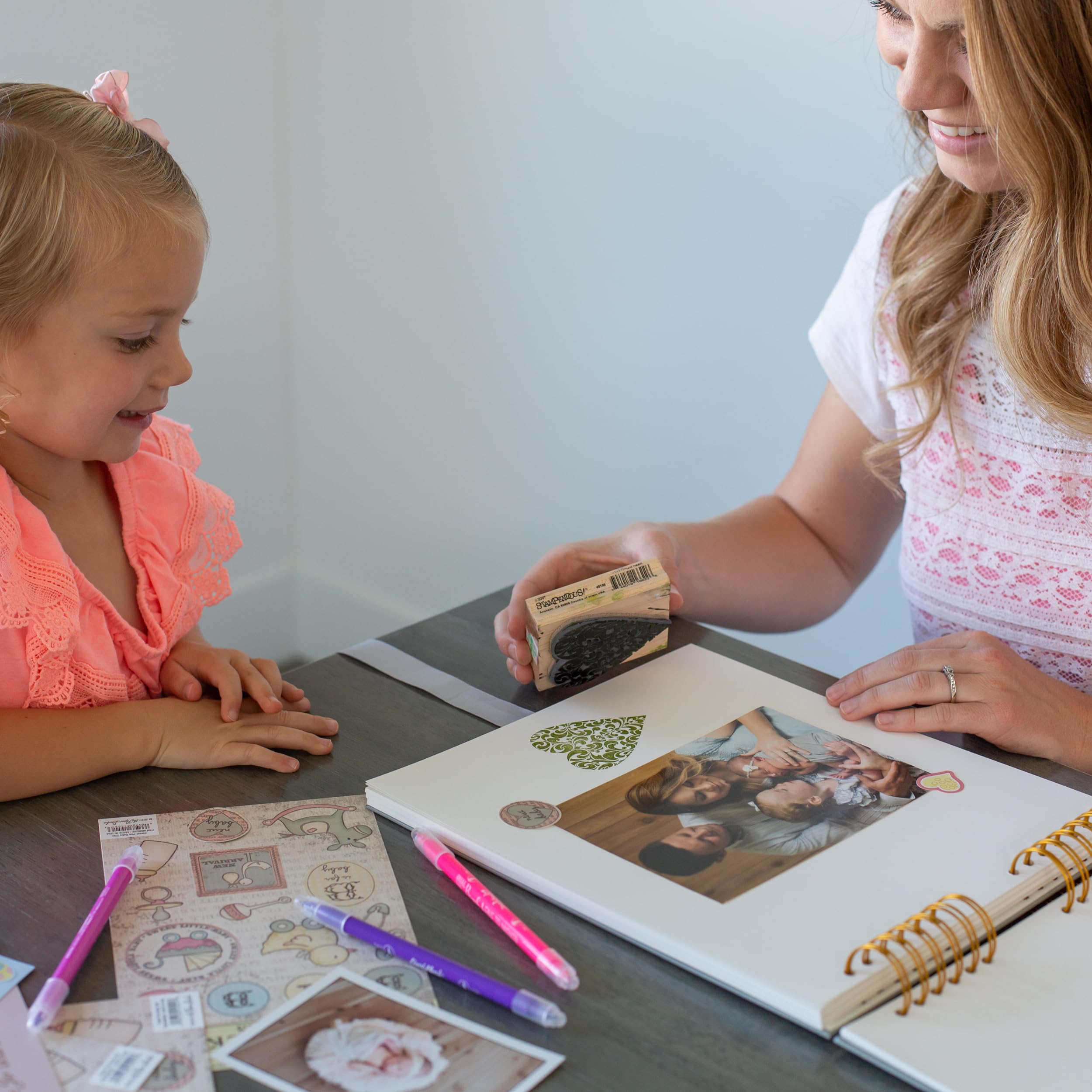 Never Ever Land scrapbook color pink adds charm for baby girl memories.