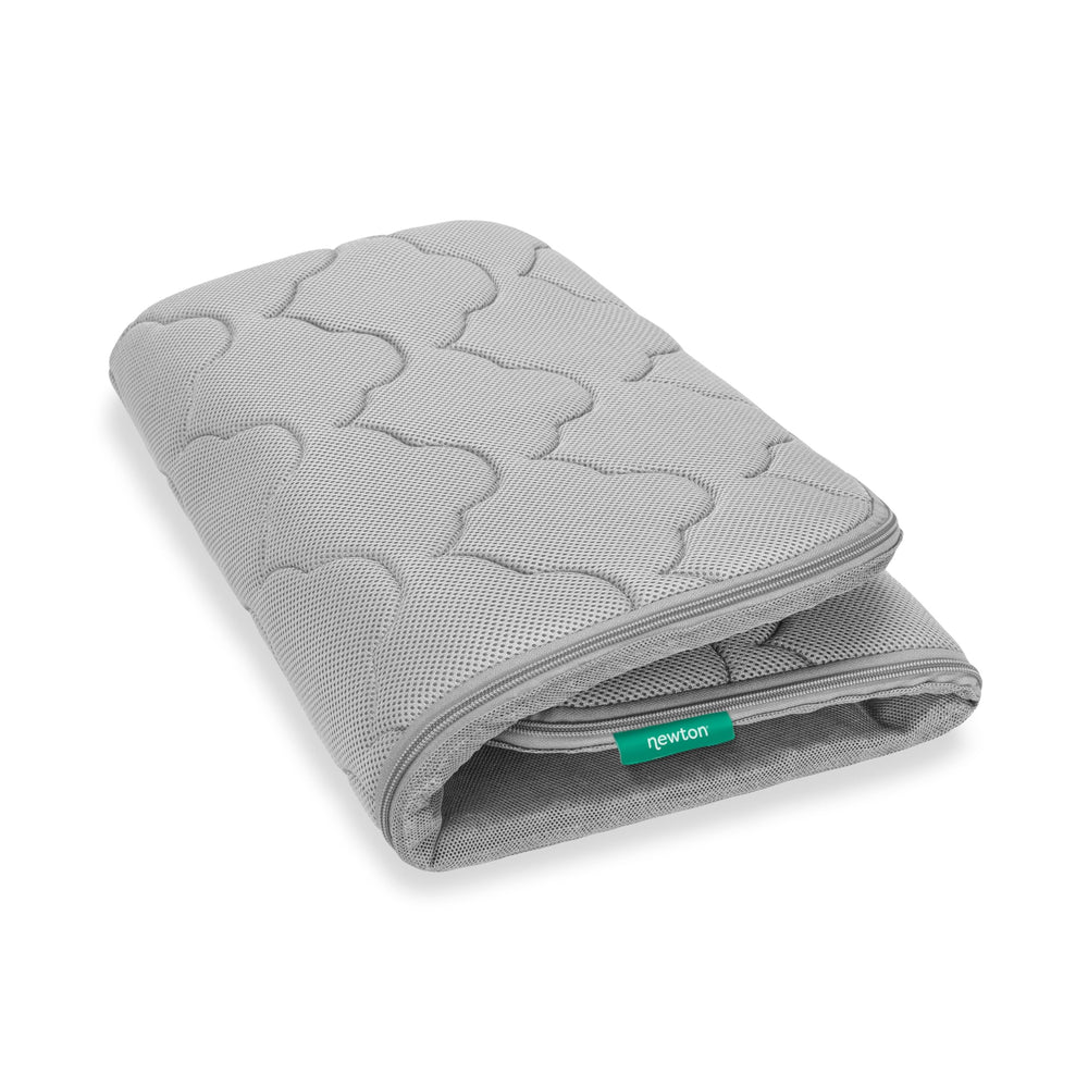 Newton Baby Extra Bassinet Cover gray care instructions; machine washable for easy maintenance.