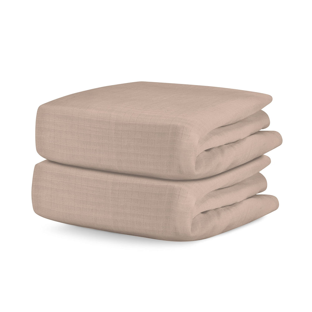 Newton Baby fitted crib sheet clay closeup showcases breathable organic cotton for baby comfort