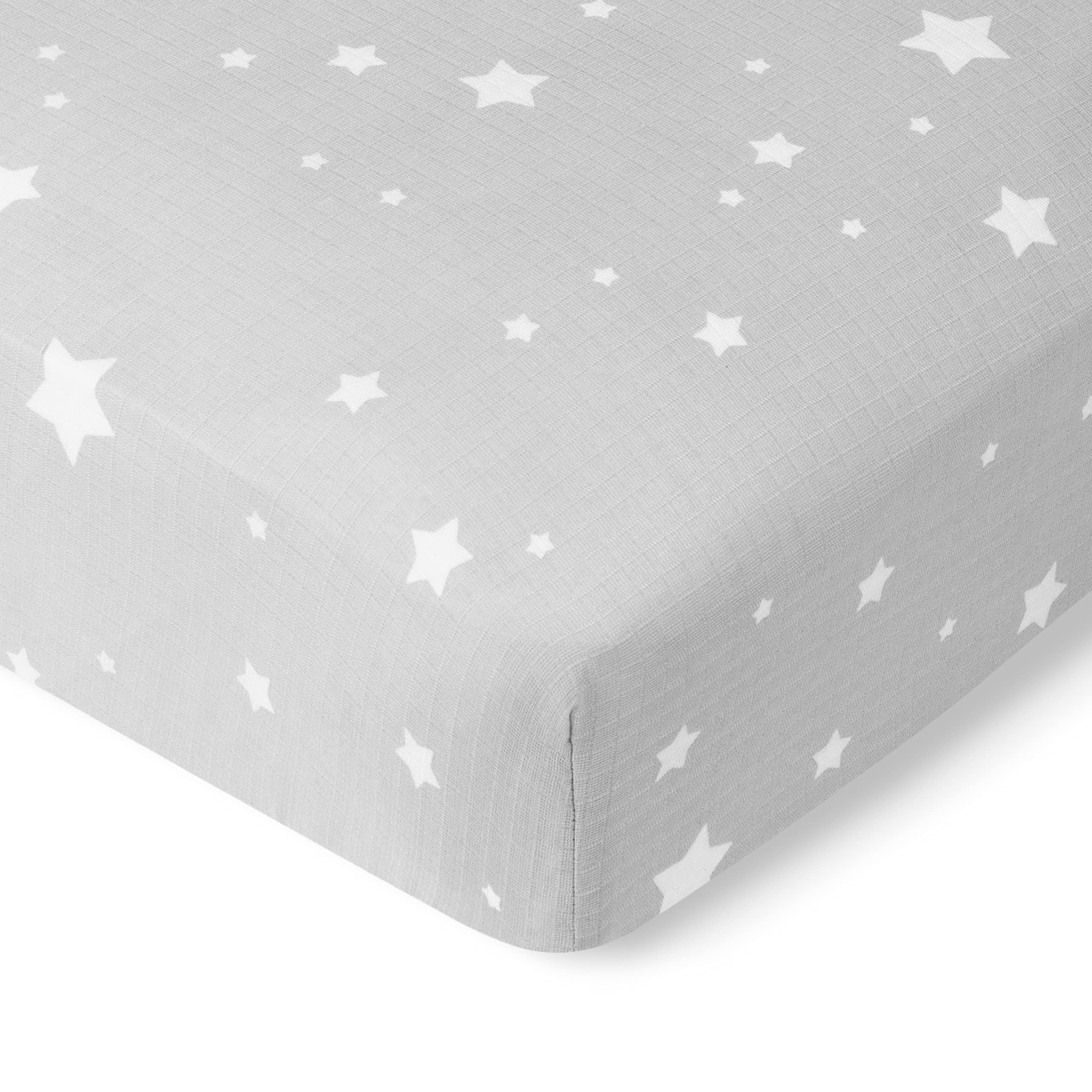Newton Baby fitted crib sheet with secure elastic fit on standard crib