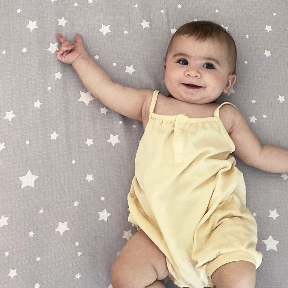 Newton Baby fitted crib sheet organic cotton weave highlights breathable, safe sleep