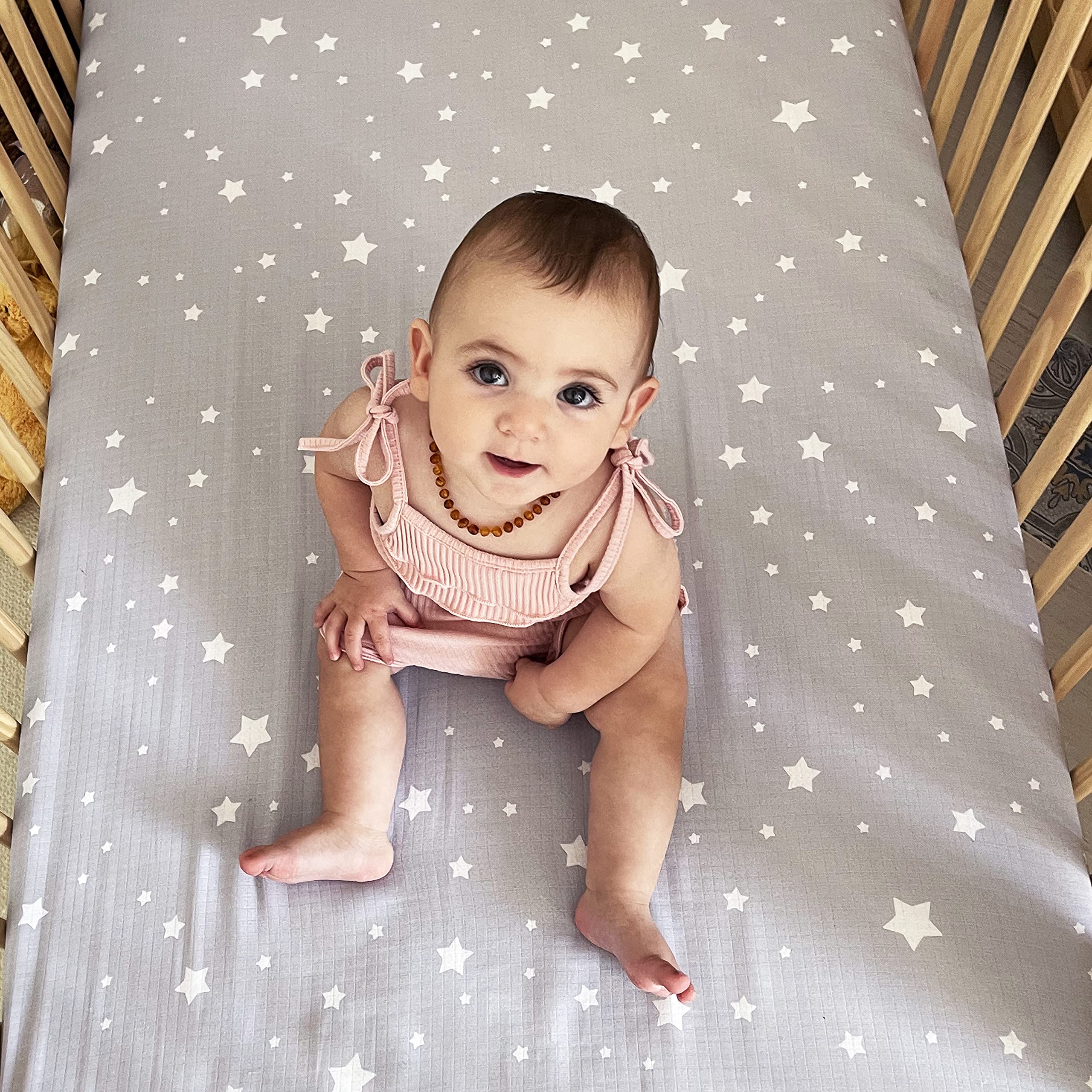 Newton Baby two-pack fitted crib sheets, convenient spare on hand