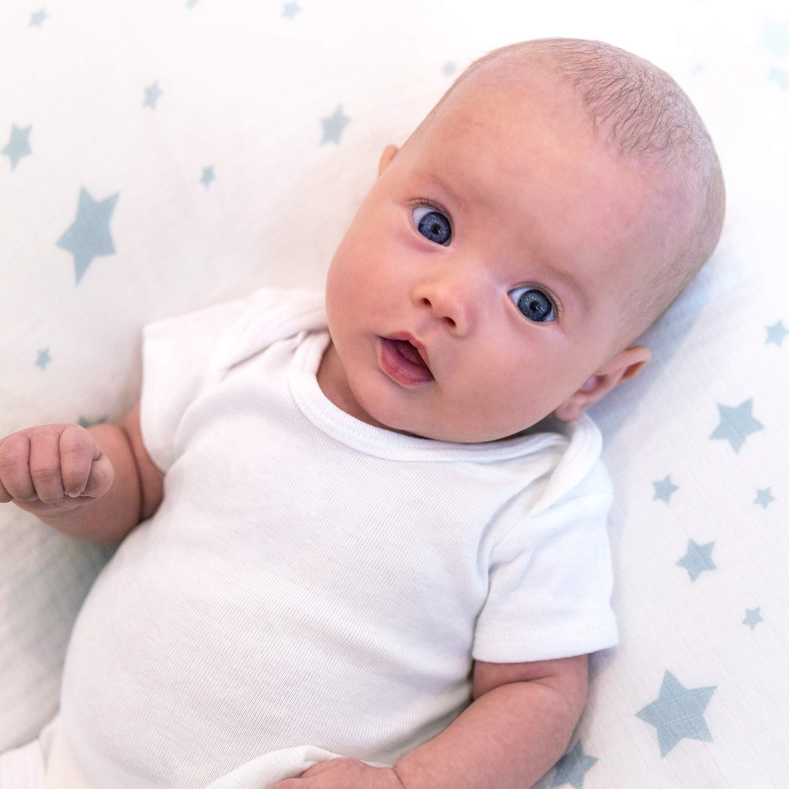 Newton Baby fitted crib sheet standard 52x28 with all-around elastic for snug fit.
