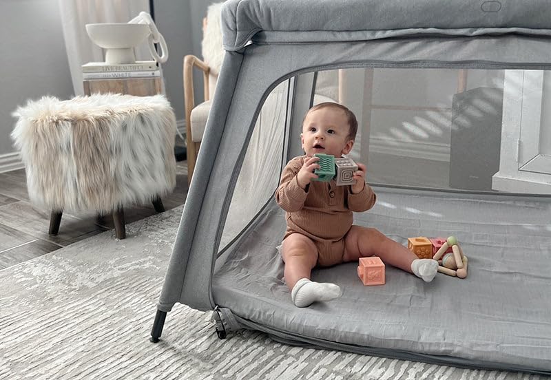 Newton Baby two-pack sheet set enables quick swaps during trips.